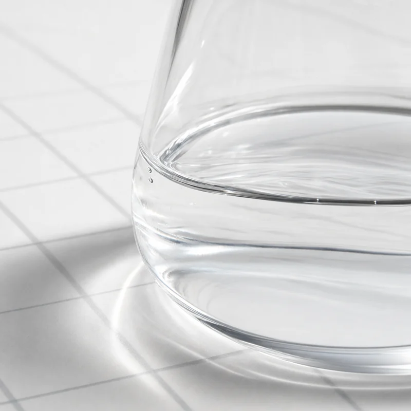 Clear glass with water; clarity and transparency metaphor